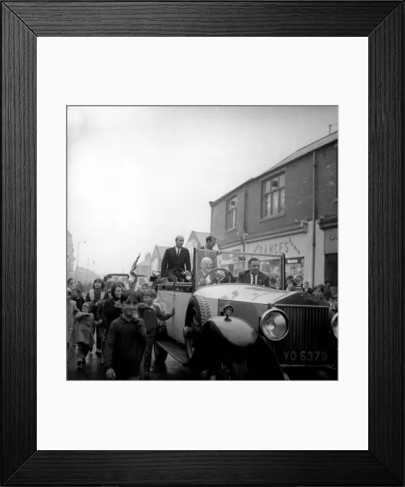 Framed Print : Jack and Bobby Charlton look over-awed as youngsters crowd around the car taking them to Framed Print : Jack and Bobby Charlton look over-awed as youngsters crowd around the car taking them to