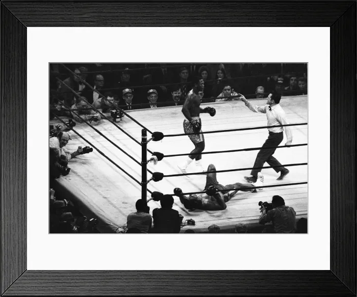Framed Print : Muhammad Ali seen here after being knock to the canvass during his world title fight Framed Print : Muhammad Ali seen here after being knock to the canvass during his world title fight