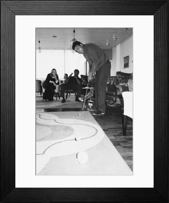 Framed Print : Muhammad Ali seen here playing a round of tea cup golf at his hotel near Dublin Framed Print : Muhammad Ali seen here playing a round of tea cup golf at his hotel near Dublin