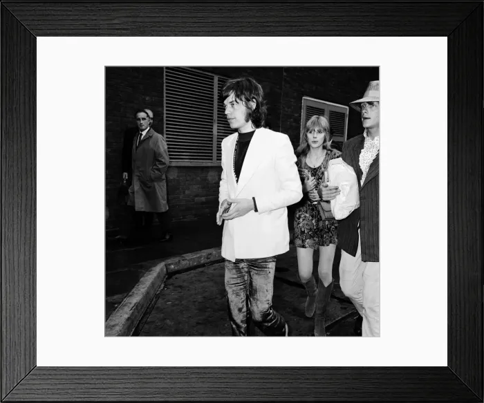 Framed Print : Rolling Stones lead singer Mick Jagger arrives at London Heathrow Airport with Marianne Framed Print : Rolling Stones lead singer Mick Jagger arrives at London Heathrow Airport with Marianne