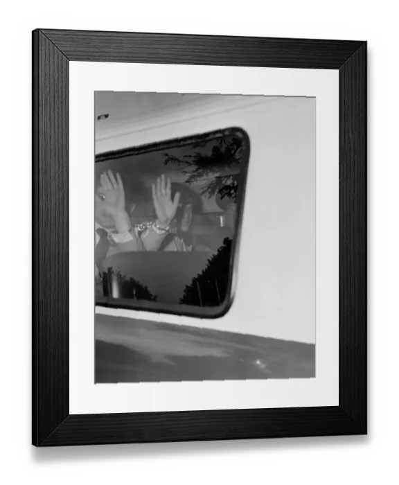 Framed Print : Mick Jagger of The Rolling Stones is besieged by reporters after leaving court in