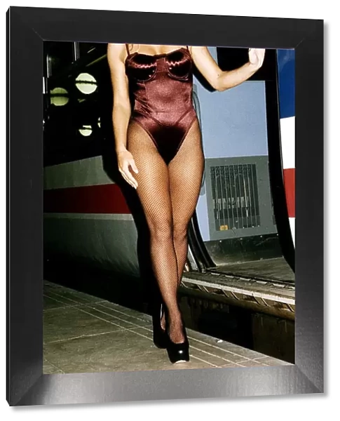 Suzanne Mizzi Model standing on liverpool street station modeling underwear