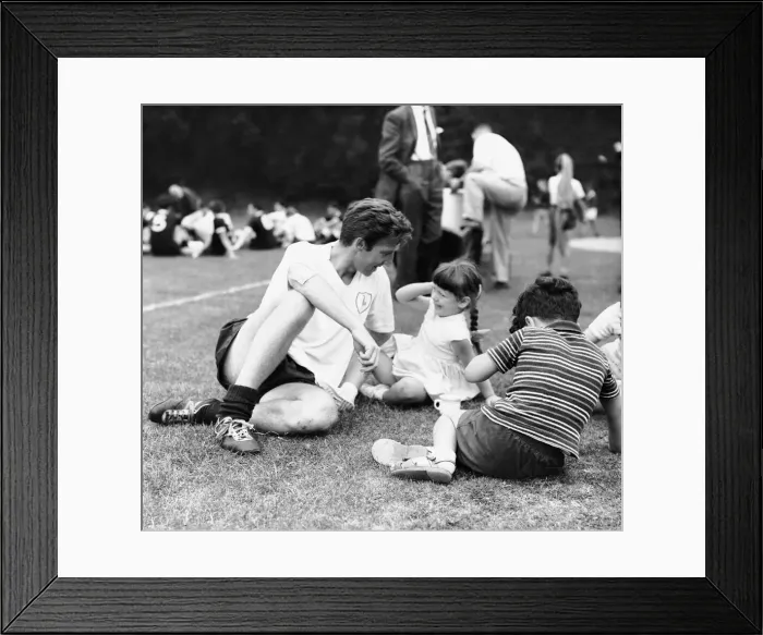 Framed Print : Cliff Jones of Tottenham Hotspur with children during a training session at Cheshunt Framed Print : Cliff Jones of Tottenham Hotspur with children during a training session at Cheshunt