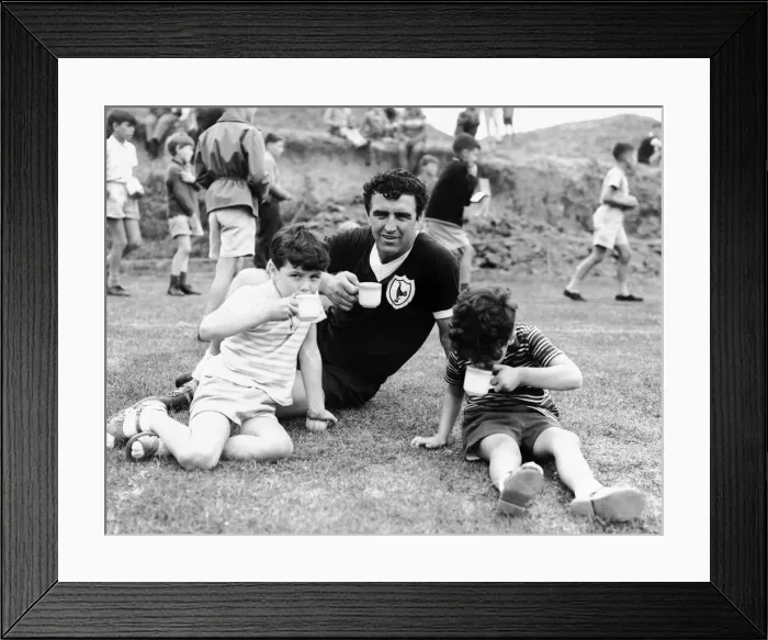 Framed Print : Bobby Smith of Tottenham Hotspur drinking a cup of tea with two young boys during a Framed Print : Bobby Smith of Tottenham Hotspur drinking a cup of tea with two young boys during a