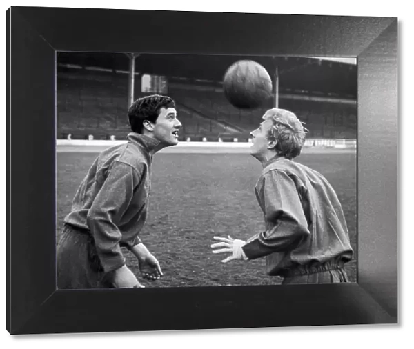 Jim Baxter and Denis Law of Scotland practice before their International against Ireland