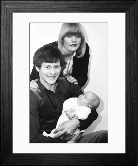 Framed Print : Snooker player Alex Hurricane Higgins with his baby daughter Lauren Framed Print : Snooker player Alex Hurricane Higgins with his baby daughter Lauren