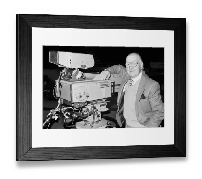Framed Print : BBC snooker commentator Ted Lowe standing beside a television camera