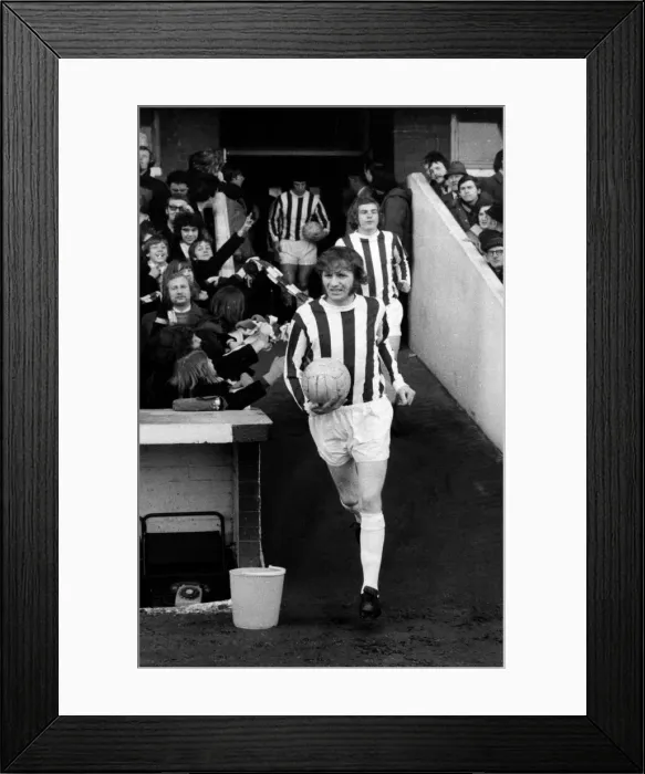 Framed Print : Terry Conroy of Stoke, leads the team out, at the Victoria Ground, March 1972 Framed Print : Terry Conroy of Stoke, leads the team out, at the Victoria Ground, March 1972