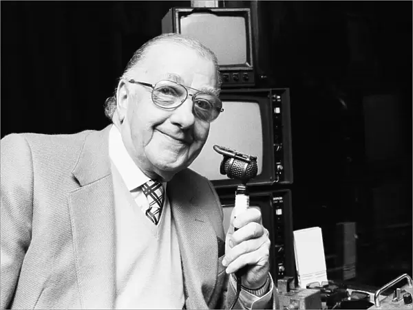 BBC snooker commentator Ted Lowe holding his microphone. 27th January 1986