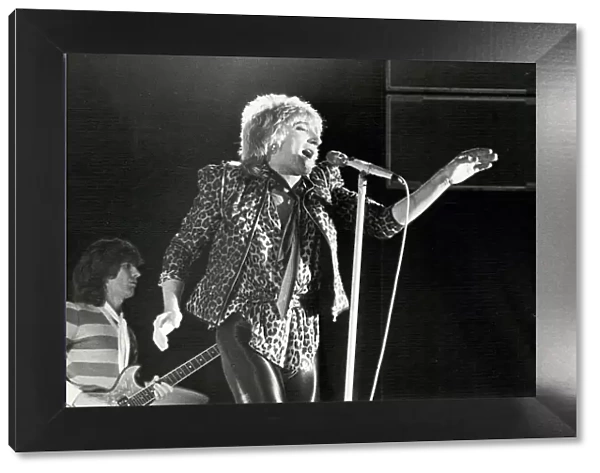 Rod Stewart performing on stage during a concert at the NEC. 17th December, 1978