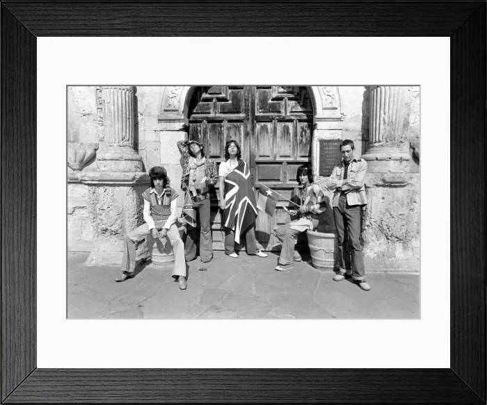Framed Print : Mick Jagger (with Union Jack flag) and his Rolling Stones band stand at the famous Alamo Framed Print : Mick Jagger (with Union Jack flag) and his Rolling Stones band stand at the famous Alamo