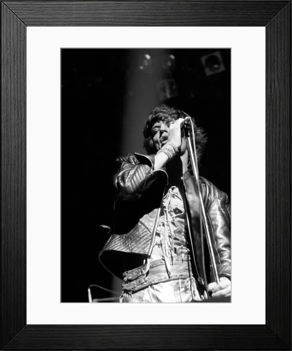 Framed Print : The Rolling Stones performing in concert. Singer Mick Jagger. September 1973 Framed Print : The Rolling Stones performing in concert. Singer Mick Jagger. September 1973