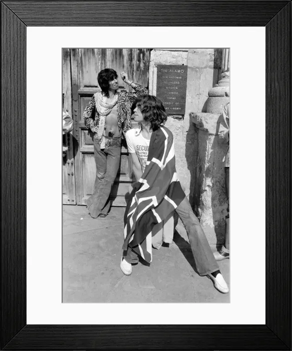 Framed Print : Mick Jagger (with Union Jack flag) and his Rolling Stones band stand at the famous Alamo Framed Print : Mick Jagger (with Union Jack flag) and his Rolling Stones band stand at the famous Alamo