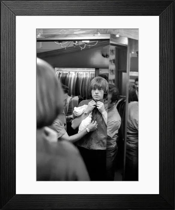 Framed Print : Brian Jones on the morning of 4 June 1964 when The Rolling Stones were taken shopping by