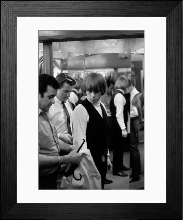Framed Print : Brian Jones on the morning of 4 June 1964 when The Rolling Stones were taken shopping by