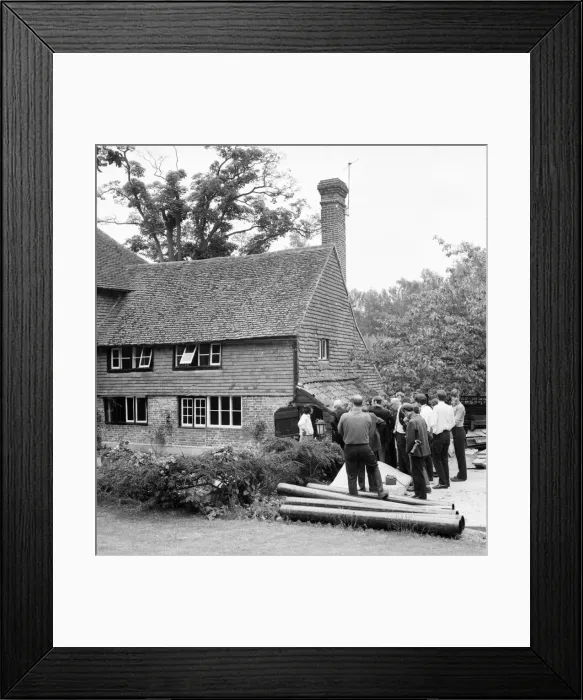 Framed Print : Rolling Stones: Brian Jones death. Tom Keylock, Stones gofer, outside Cotchford Farm