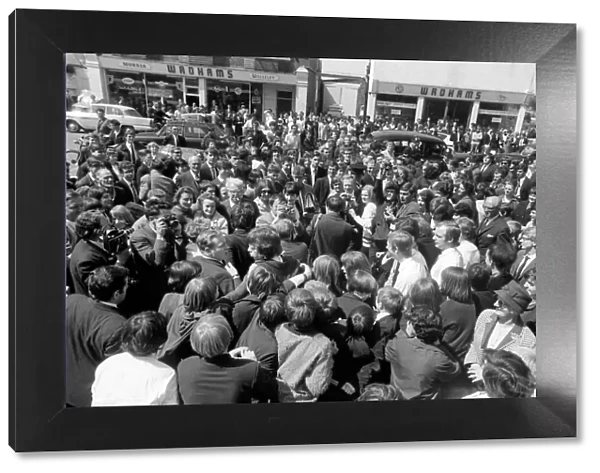 Crowds wait throng around Mick Jagger and Keith Richards on 10 May 1967 outside