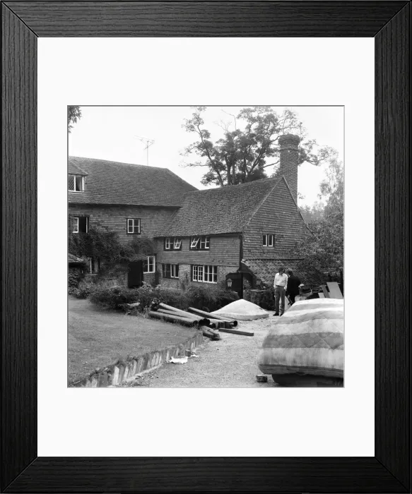 Framed Print : Rolling Stones: Brian Jones death. Tom Keylock, Stones gofer, outside Cotchford Farm