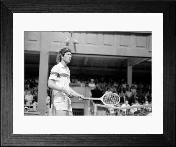 Framed Print : John McEnroe v Tom Gullikson, first round match at Wimbledon on Court Number One