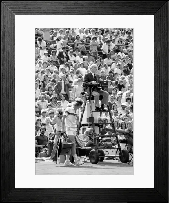 Framed Print : John McEnroe v Tom Gullikson, first round match at Wimbledon on Court Number One Framed Print : John McEnroe v Tom Gullikson, first round match at Wimbledon on Court Number One