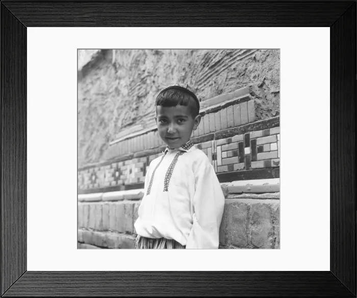 Framed Print : Small boy seen here dressed in the national costume of the central steppes of Russia Framed Print : Small boy seen here dressed in the national costume of the central steppes of Russia