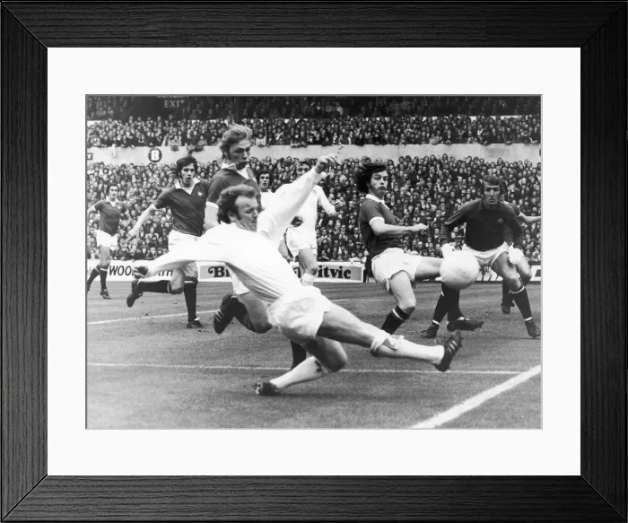 Framed Print : Leeds United v. Manchester United. Leeds United captain Billy Bremner shoots for Framed Print : Leeds United v. Manchester United. Leeds United captain Billy Bremner shoots for