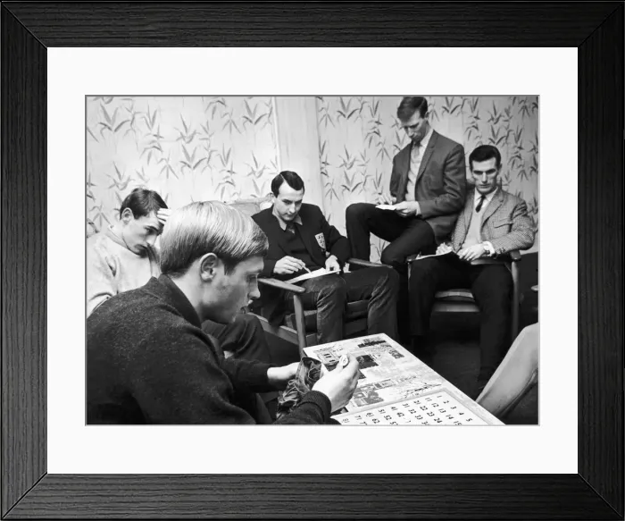 Framed Print : Leeds United players playing Bingo to keep their minds off the game until the last minute Framed Print : Leeds United players playing Bingo to keep their minds off the game until the last minute