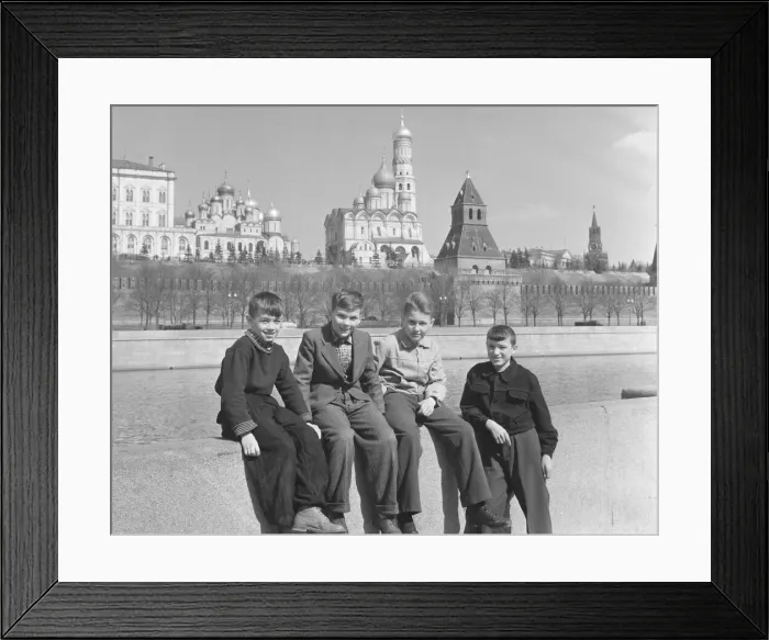 Framed Print : Four schoolchildren pose on the banks of the Moskva River in Moscow Framed Print : Four schoolchildren pose on the banks of the Moskva River in Moscow