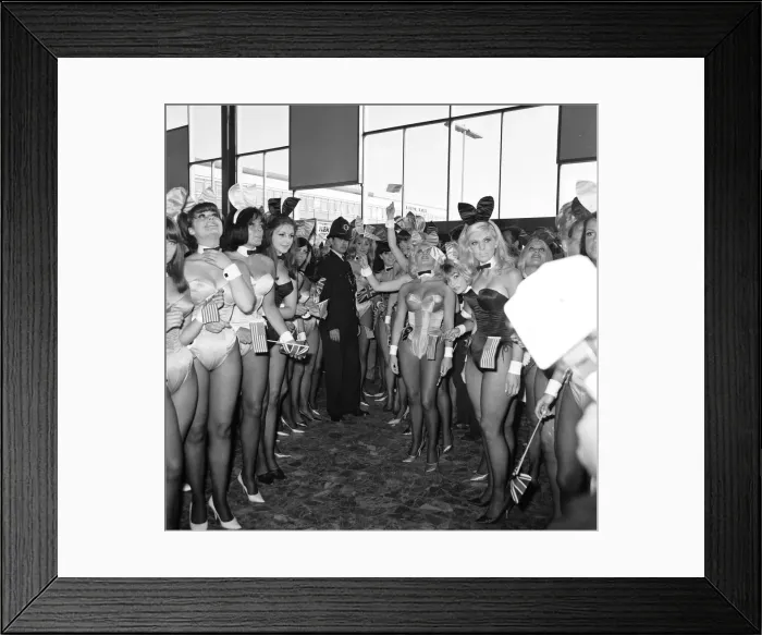 Framed Print : Hugh Hefner Boss of the Playboy Empire arrives with an entourage of Bunny Girls at London Framed Print : Hugh Hefner Boss of the Playboy Empire arrives with an entourage of Bunny Girls at London