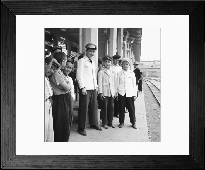Framed Print : Teenage boys seen here waiting on the platform of an un-named town in central Russia
