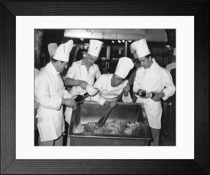 Framed Print : Comedian Frankie Howerd seen here giving the chefs of an unnamed Coventry hotel a hand in Framed Print : Comedian Frankie Howerd seen here giving the chefs of an unnamed Coventry hotel a hand in