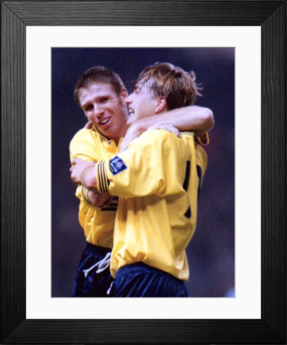 Framed Print : Oxfords Nigel Jemson celebrates scoring the second goal against Manchester City in Framed Print : Oxfords Nigel Jemson celebrates scoring the second goal against Manchester City in