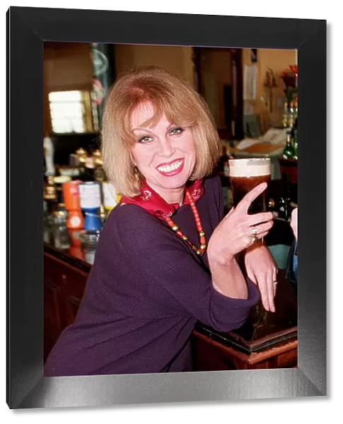 Joanna Lumley actress swops the bolly for a pint today to launch a new pub