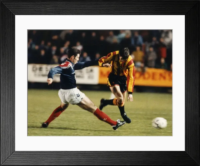 Framed Print : Falkirk footballer David Weir moving in to cut out the threat of Gerry Britton during