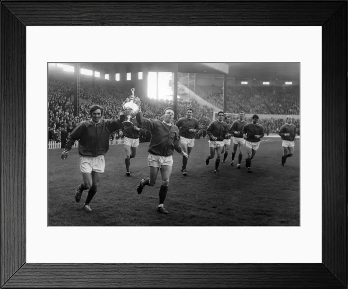 Framed Print : Manchester United footballers George Best and Nobby Stiles hold aloft the League Framed Print : Manchester United footballers George Best and Nobby Stiles hold aloft the League
