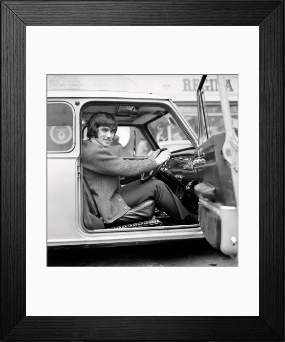Framed Print : Manchester United footballer George Best, whose six-month driving ban has just ended Framed Print : Manchester United footballer George Best, whose six-month driving ban has just ended