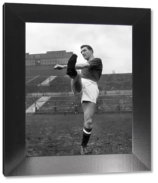 Manchester United footballer Bill Foulkes during a training session. March 1957