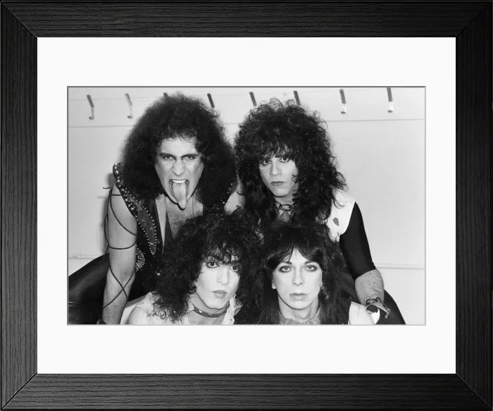 Framed Print : American rock group Kiss seen here in a very quick break between numbers at their concert