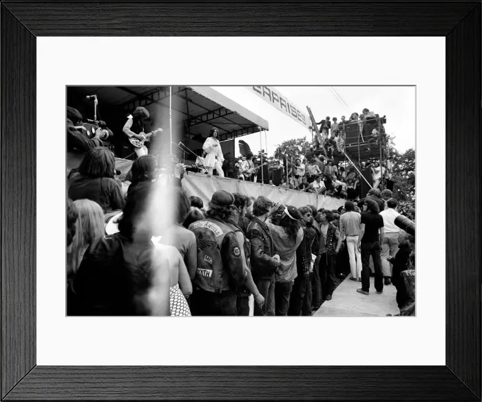 Framed Print : The Rolling Stones on stage watched by Hells Angels at their free concert in London