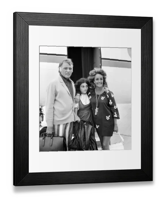Framed Print : Elizabeth Taylor and Richard Burton with daughter Liza leave London Airport (Heathrow