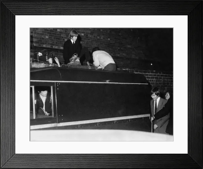 Framed Print : Brian Jones, on the wall Mick Jagger with back to camera Charlie Watts behind Land Rover Framed Print : Brian Jones, on the wall Mick Jagger with back to camera Charlie Watts behind Land Rover