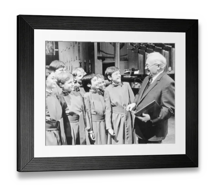 Framed Print : Sir Harry Secombe chats with some of the choirboys during a break in making the TV