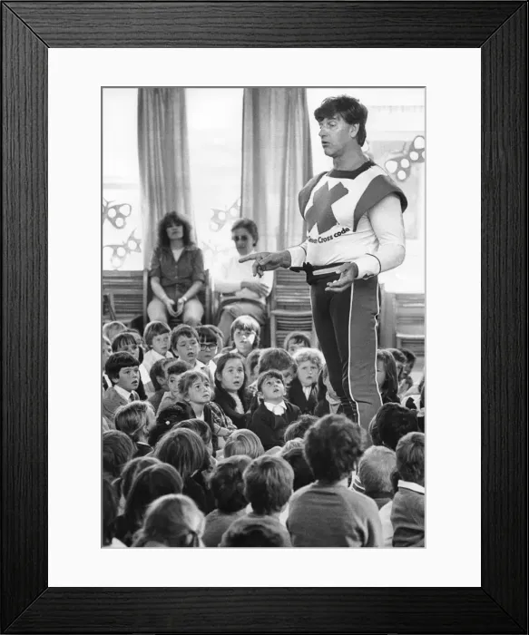 Framed Print : A giant of a man with a serious message for schoolchildren Framed Print : A giant of a man with a serious message for schoolchildren