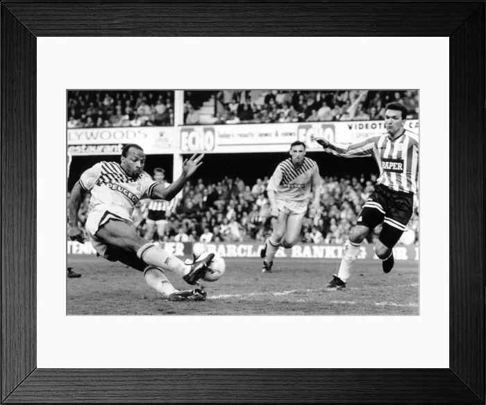 Framed Print : Coventry Citys player, Cyrille Regis is off target from a scoring chance as Framed Print : Coventry Citys player, Cyrille Regis is off target from a scoring chance as