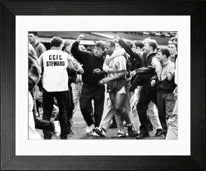 Framed Print : Cyrille Regis is surrounded by adoring Sky Blue fans at the end of his last home game for Framed Print : Cyrille Regis is surrounded by adoring Sky Blue fans at the end of his last home game for