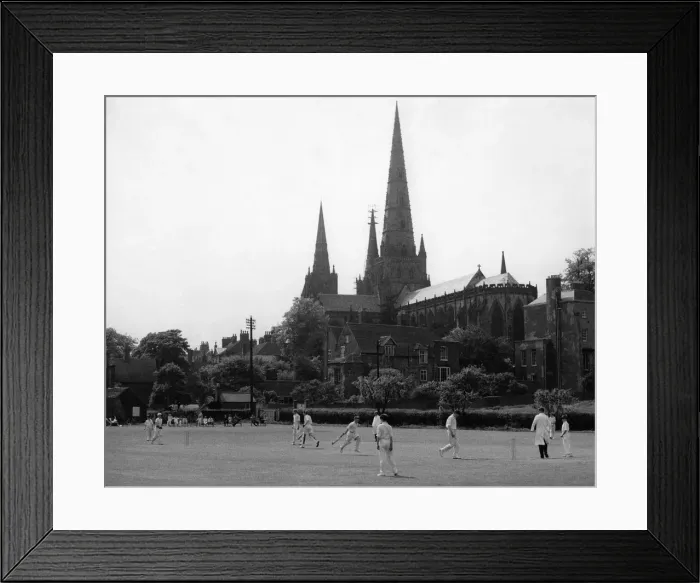 Framed Print : Boys playing cricket in the shadow of Lichfield Cathedral at St Framed Print : Boys playing cricket in the shadow of Lichfield Cathedral at St