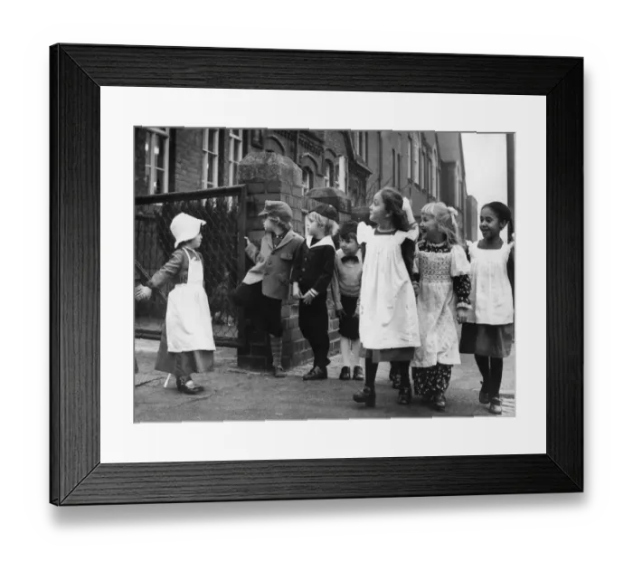 Framed Print : It looked like a scene from Dickens as these youngsters made their way to school in