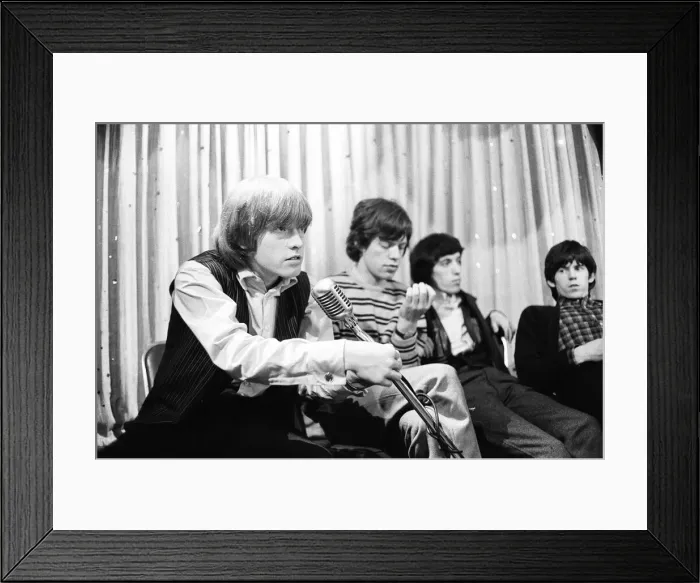 Framed Print : The Rolling Stones at a press conference after meeting fans on Broadway
