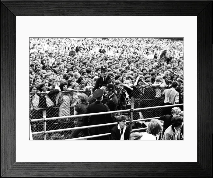 Framed Print : The Rolling Stones at Longleat, home of Lord Bath. Fainting girl fans are carried Framed Print : The Rolling Stones at Longleat, home of Lord Bath. Fainting girl fans are carried