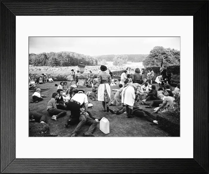 Framed Print : The Rolling Stones at Longleat, home of Lord Bath. Exhausted fans are attended to Framed Print : The Rolling Stones at Longleat, home of Lord Bath. Exhausted fans are attended to